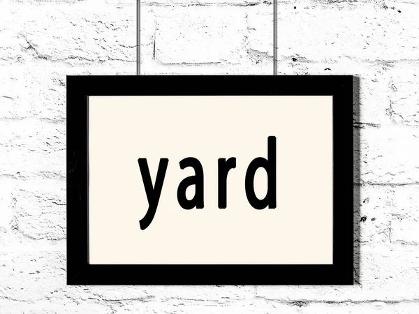 Black Wooden Frame Inscription Yard Hanging White Brick Wall — Stock Photo, Image