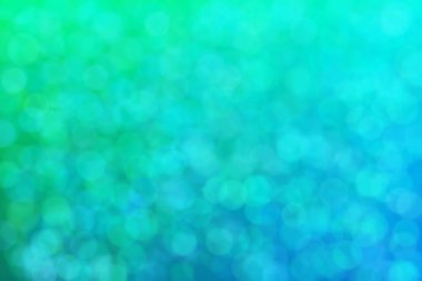 Çember biçiminde soyut arkaplan ve maviden yeşile geçiş.