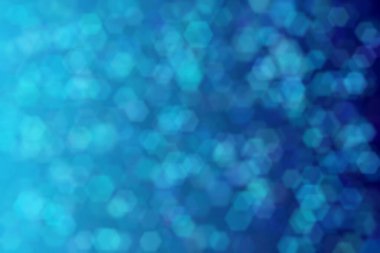 Bokeh ile soyut bir arkaplan. Yumuşak ışık odaklı noktalar.