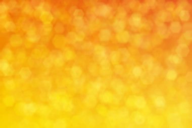 turuncu ve sarı soyutlanmış arkaplan, altıgen şekilli bokeh lekeli.