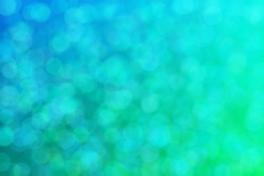 Bokeh ile soyut bir arkaplan. Yumuşak ışık odaklı noktalar.