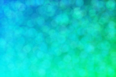 Bokeh ile soyut bir arkaplan. Yumuşak ışık odaklı noktalar.