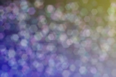 Bokeh ile soyut bir arkaplan. Yumuşak ışık odaklı noktalar.