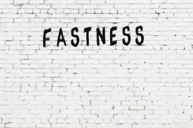 Yazma hızı beyaz tuğla duvara siyah boya ile yazıldı.