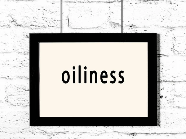 Black Wooden Frame Inscription Oiliness Hanging White Brick Wall — Stock Photo, Image