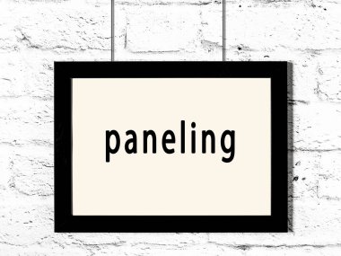 Beyaz tuğla duvara yazılı siyah ahşap çerçeve. 