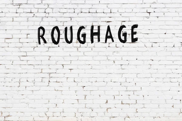 Beyaz tuğla duvara siyah boya ile yazılmış ruj..