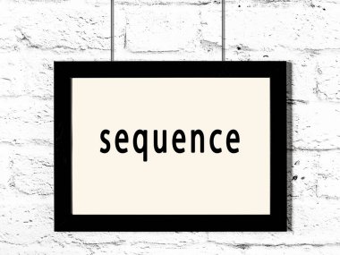 Beyaz tuğla duvara yazı dizili siyah ahşap çerçeve 