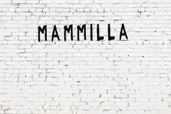 Biała Ceglana Ściana Napisem Mammilla Ręcznie Czarną Farbą — Zdjęcie stockowe