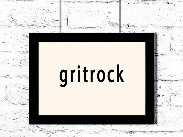 Black Wooden Frame Inscription Gritrock Hanging White Brick Wall — Stock Photo, Image