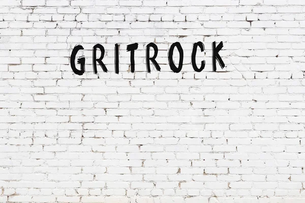 White Brick Wall Inscription Gritrock Handwritten Black Paint — Stock Photo, Image