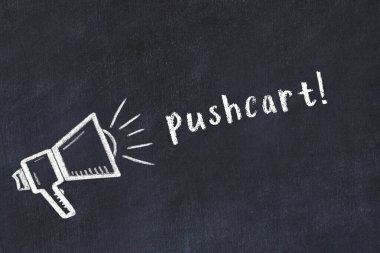 Hoparlör çizimi ve yazılı el arabası olan siyah karatahta.