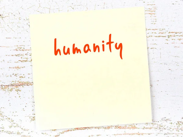 Concept Reminder Humanity Yellow Sticky Sheet Paper Wooden Wall Inscription — Stock Photo, Image