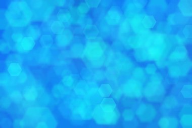 Altıgen şekilli bokeh noktalı yeşil ve mavi soyut odaklanmış arkaplan