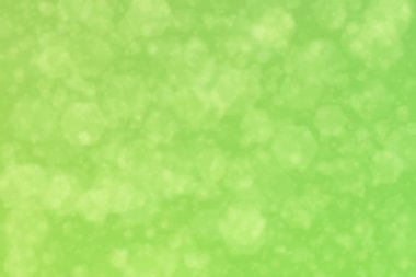 Altıgen şekilli bokeh benekli yeşil soyut odaklanmış arkaplan