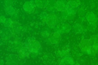 Altıgen şekilli bokeh benekli yeşil soyut odaklanmış arkaplan