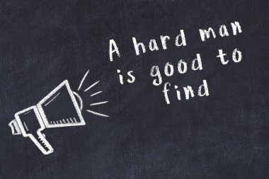 Bilge motivasyonel yazıtlı siyah karatahtaya hoparlör çizimi