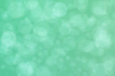 Bokeh ile soyut bir arkaplan. Yumuşak ışık odaklı noktalar.