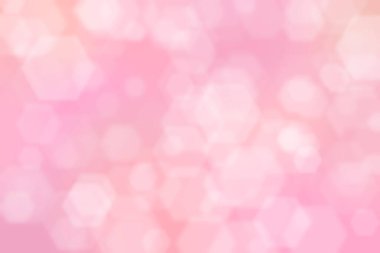 Altıgen şekilli bokeh noktalı pembe soyut odaklanmış arkaplan
