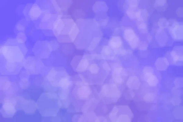 Abstract blurred light purple background with hexagon shaped spots.