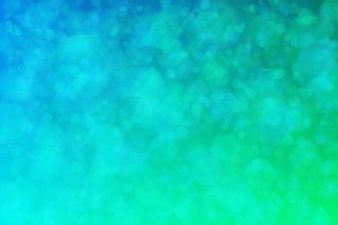 Altıgen şekilli bokeh noktalı yeşil ve mavi soyut odaklanmış arkaplan