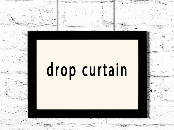 Black Wooden Frame Inscription Drop Curtain Hanging White Brick Wall — Stock Photo, Image