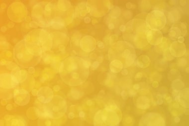 Çember şeklindeki bokeh noktalarıyla odaklanmış altın soyut arkaplan