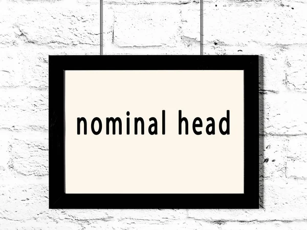 Black Wooden Frame Inscription Nominal Head Hanging White Brick Wall — Stock Photo, Image