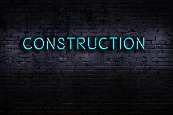 Neon Sign Inscription Construction Brick Wall Night View — Stock Photo, Image