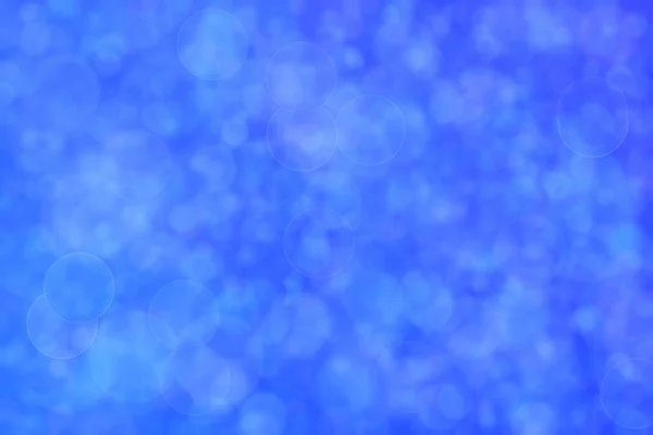 青の抽象的な背景と円の形のボケ — ストック写真