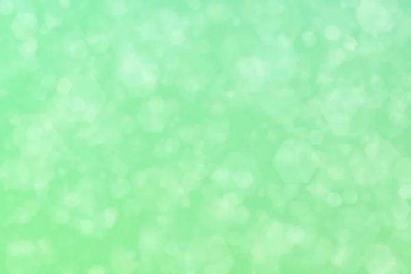Světle Zelené Abstraktní Rozostřené Pozadí Bokeh Skvrnami Tvaru Šestiúhelníku — Stock fotografie