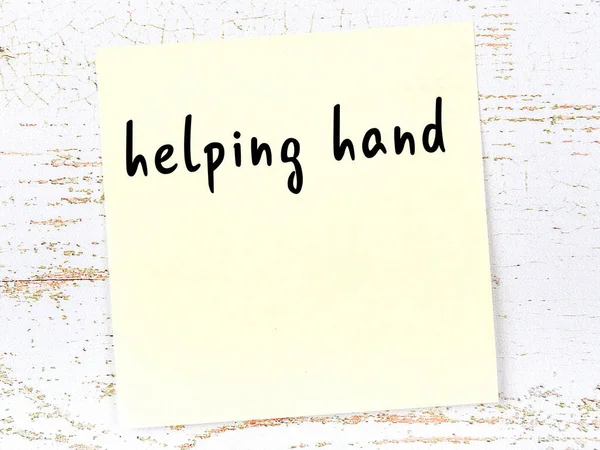 Yellow Sticky Note Wooden Wall Handwritten Inscription Helping Hand — Stock Photo, Image