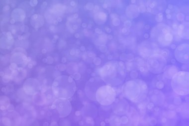 Bokeh ile soyut bir arkaplan. Yumuşak ışık odaklı noktalar.