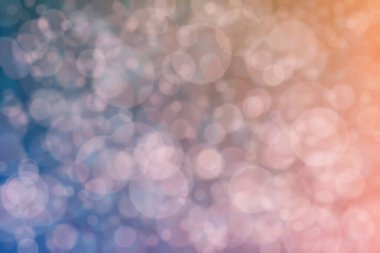 Bokeh ile soyut bir arkaplan. Yumuşak ışık odaklı noktalar.