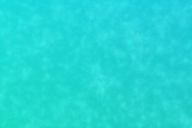 Deniz mavisi. Su derinliğinde bulanık noktaları olan soyut arkaplan