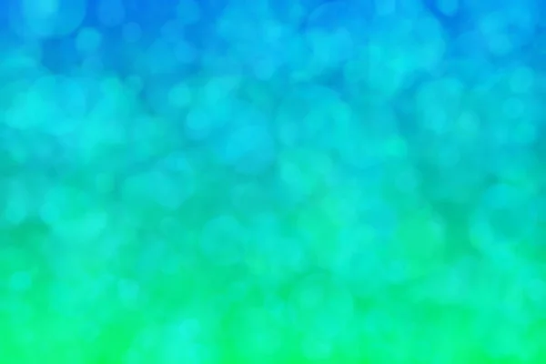 Green and blue abstract background with color transitions from green to blue and circle shaped spots.