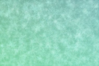 Aquamarine soyut çözünmüş arkaplan yıldız şekli bokeh benekleri ile