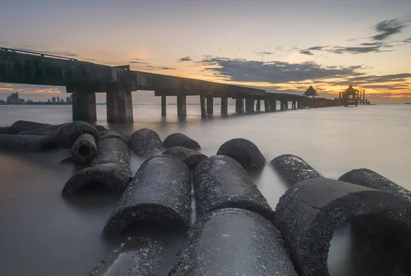 bridge at Djittabhawan Temple tourist attraction with sunset in Pattaya,Thailand