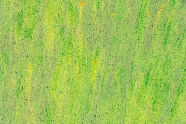 Vibrant messy grunge green background. Industrial abstract art. Rusty metallic sheet with bright paint strokes. Urban city recycled creative rough texture. Youth culture street art positive surface.