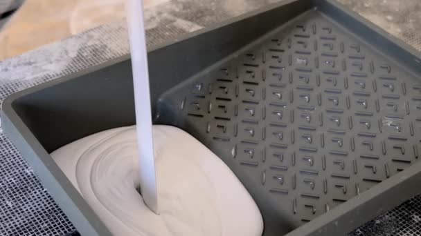 Pouring White Paint Into The Tray Slow Motion 1 — Stock Video