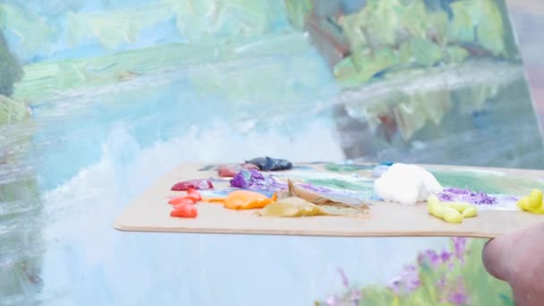Pintura com aquarelas na lona — Vídeo de Stock