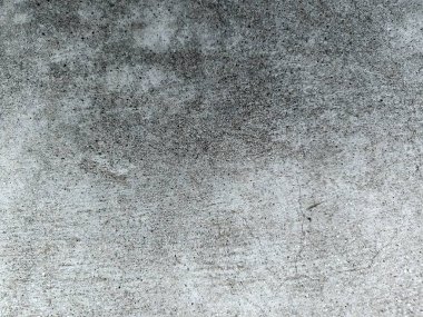 Soyut Grunge Çimento Duvarı Dokusunun Doğal Beton Yüzeyi. Yüksek çözünürlüklü soyut grunge beton duvar dokusu. Doğal beton bir yüzey, yıpranmış lekeler, çatlaklar ve ince detaylar. Arka planlar için ideal