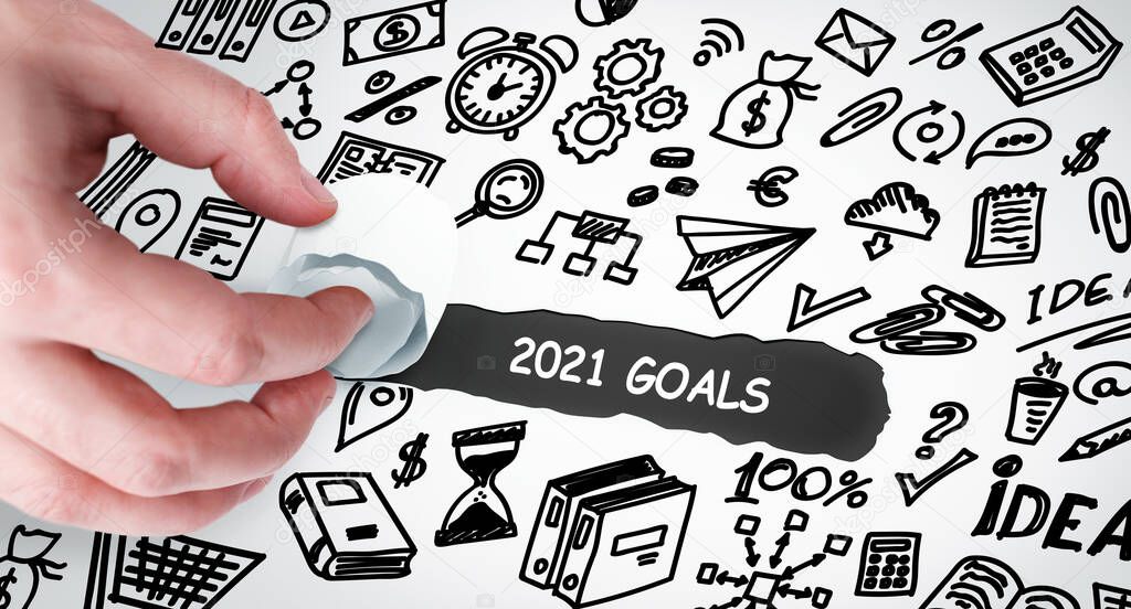 Technology, Internet and network concept. Young businessman shows the word: 2021 goals 