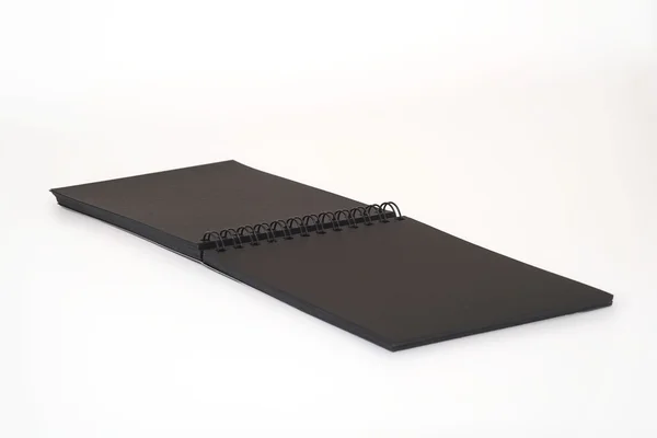 Black notebook with spiral — Stock Photo, Image