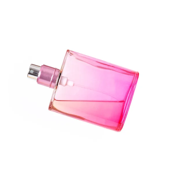 白い背景にピンクの香水瓶のレイアウト — ストック写真