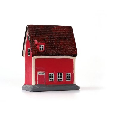 Baltık devletlerinden seramik bir hatıra. Üzerinde beyaz arka planda izole edilmiş ünlü eski evlerin resmi var.