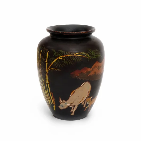 Vietnamese wooden souvenir vase with a picture isolated on a white background