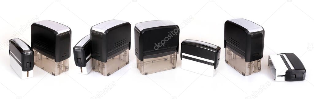 Black plastic automatic stamps for documents isolated on white background