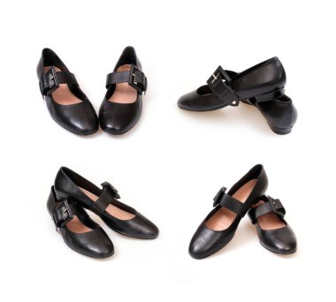 Siyah deri güzel alçak topuklu siyah ayakkabılar beyaz arka planda izole edilmiş.