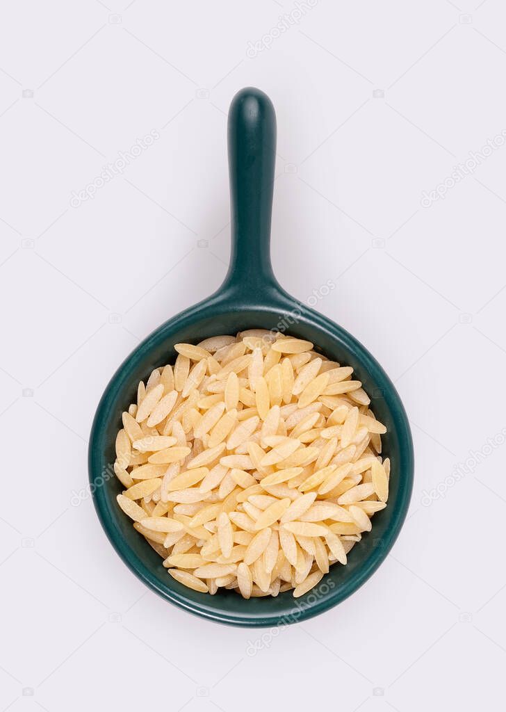 Small trial portion of Italian risotto on platter isolated on white background. Design element with clipping path